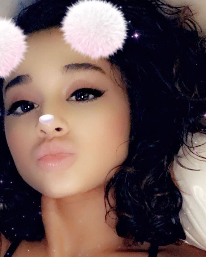 **Ariana Grande**<br><br>
Giving her signature ponytail a break, Grande took to Instagram in August to again show off her natural curls, which are "coming in strong with a little [TLC]."