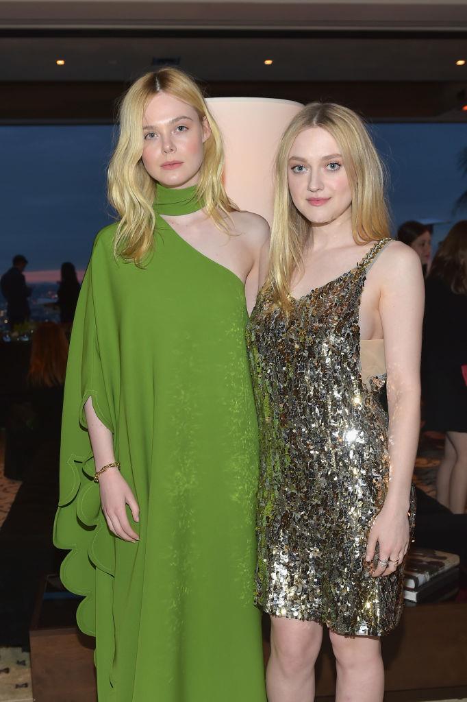 **Elle and Dakota Fanning**
<br><br>
Not only are these celebrity sisters (who are roughly four years apart in age) both immensely talented, they also both share the same blue eyes, blonde hair and perfectly pale skin tone.