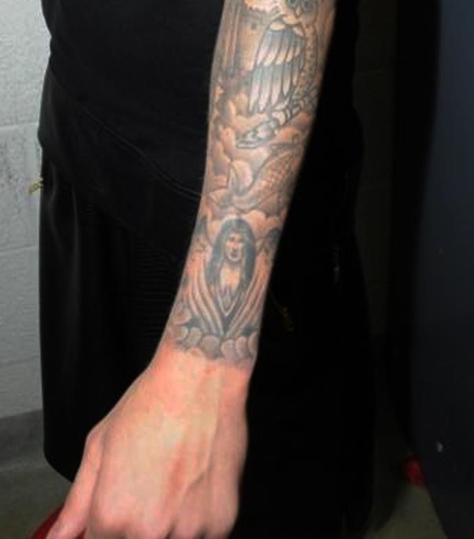 This tattoo on Justin Bieber's wrist is of his ex-songstress girlfriend, Selena Gomez. He said of it: "This is my ex-girlfriend, so I tried to cut her face up with some shading, but people still know."