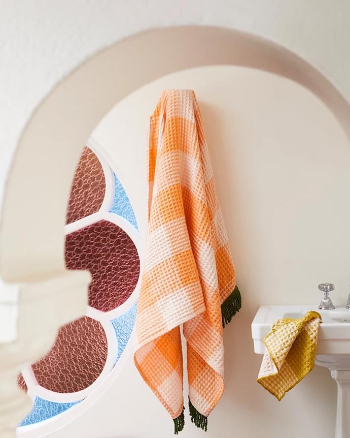 **Sage x Clare**
<br><br>
If all summer means to you is bright colours and bold prints, then Sage x Clare is the home wares label for you. Their cotton waffle towels are lightweight and absorbent and perfect for travel, and their citrus shades are also perfect for brightening up a poolside tableau.
<br><br>
*Shop Sage x Clare towels [here](https://sageandclare.com/collections/bathe/towels|target="_blank"|rel="nofollow").*