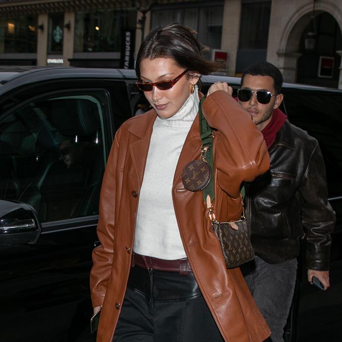 **January 2020** For one of her first celebrity street-style outings of the year, Hadid paired this leather coat with a miniature Louis Vuitton pochette bag, and a baby coin purse attached for good measure.