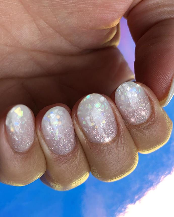 **Opal Ombré Nails**<br><br>

Almost kaleidoscopic in effect, 'opal ombré nails' are the shimmery, new season answer to the marble nail trend of previous seasons. This jewel-like appearance is created through the use of multiple elements, including foils, inks, flakes and both sheer and opaque gels.<br><br>

*Image via [@nailsbymh](https://www.instagram.com/p/BhZYAHJgU9Q/|target="_blank"|rel="nofollow")*