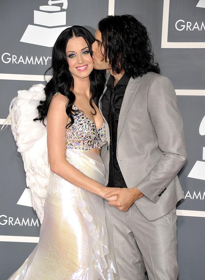 **Katy Perry and Russell Brand** <br><br>
Though they're no longer together (and Perry is expecting her [first child](https://ellaau.com/celebrity/katy-perry-pregnant-23131|target="_blank") with Orlando Bloom), the singer apparently "threw a water bottle" at her future husband when they first met in order to get his attention. <br><br>
In his 2010 book, Brand wrote: "Thud. Ouch. The bottle hit me right on the head and, although it was plastic, it was half full, or half empty, depending on your perspective, and it hurt." While some people might be put off by such a move, Brand wrote: "The truth is I fell in love with her when she hit me with that bottle. Like Cupid in a riot."