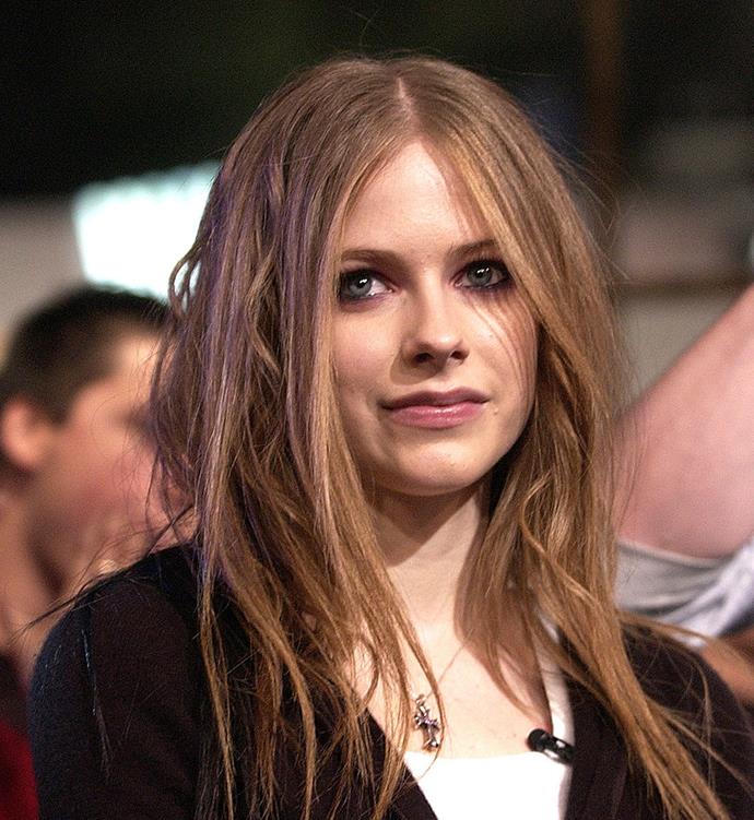 **Super Straight Hair With Random Waves**<br><br>

**The celebrity muse:** Avril Lavigne<br><br>

Again, what was with our need to sport two hairstyles at once? Much like the crimped-and-curled duet, combining super straight hair with random waves was oddly popular back then, and knowing beauty trend cycles, we shudder to think that it'll probably come back.