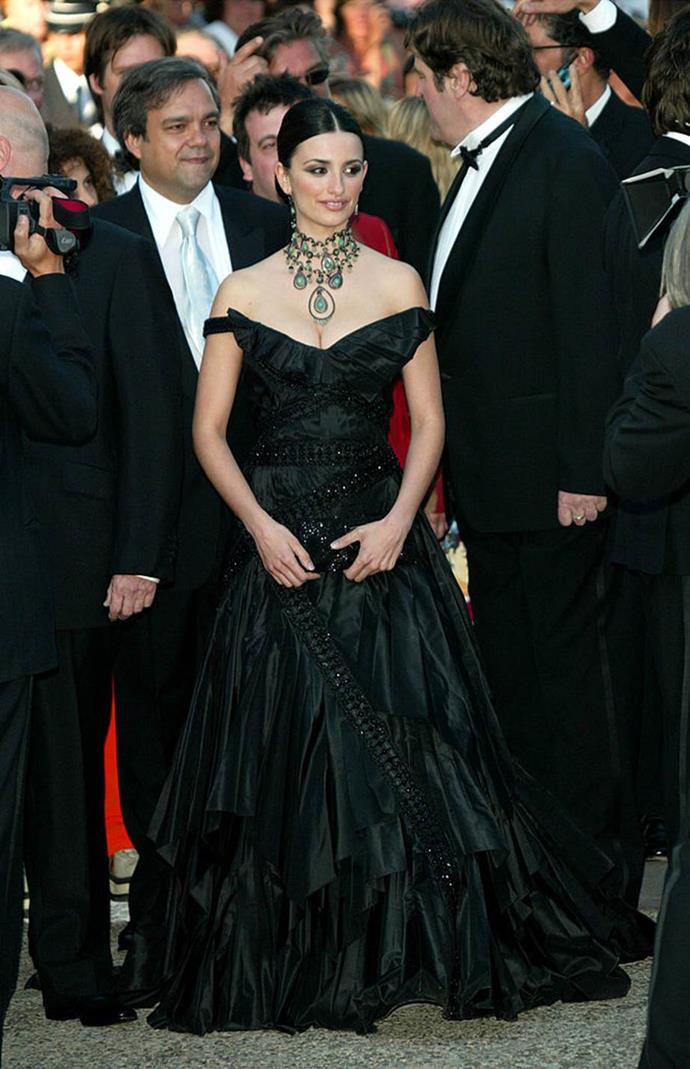 **Penélope Cruz in Dior Haute Couture at the 2003 Cannes Film Festival**<br><br>

Dramatic Dior? Check. Showstopping accessory? Done. The kind of elegance that will transcend time? You bet.
