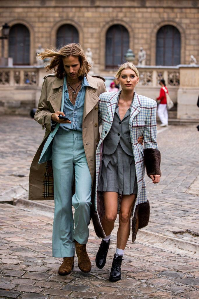 **Elsa Hosk and Tom Daly**
<br><br>
You'd be forgiven for thinking that this image was straight out of a fashion editorial, but no. This is just another *very* chic streetstyle snap of supermodel Elsa Hosk and her equally stylish partner, Tom Daly, coordinating their outfits. Honestly, we'd wear both of these looks any day.