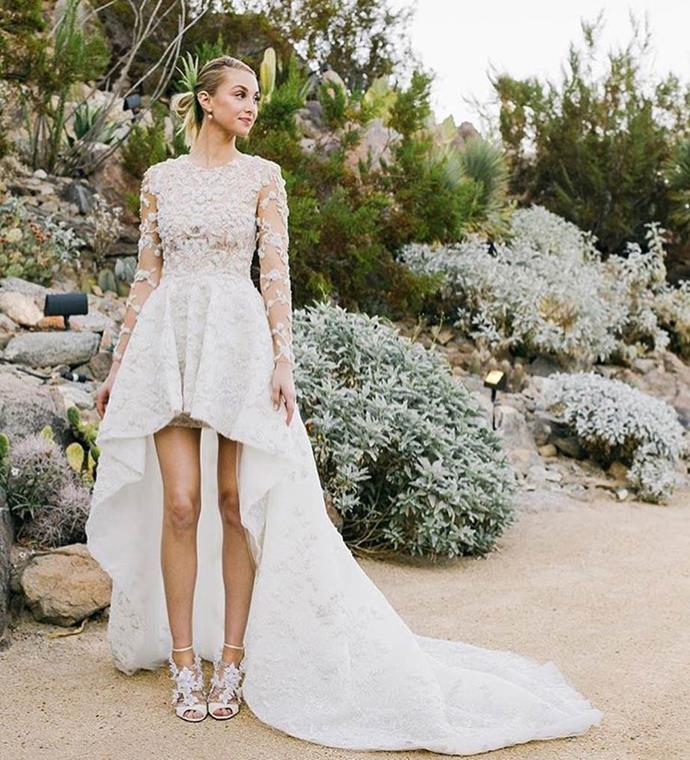 Whitney Port wearing a high-low wedding dress by Mohammed Ashi in 2016.<br><br>

*Image via [@hannah.costello](https://www.instagram.com/Hannah.Costello/|target="_blank"|rel="nofollow")*