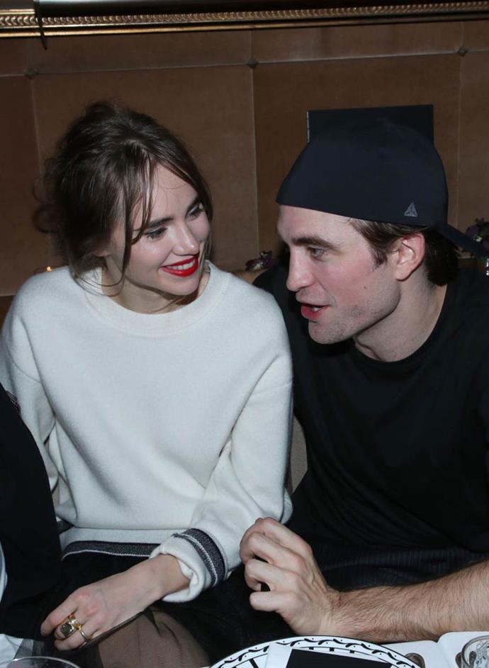 **Robert Pattinson: July 2018**
<br><br>
In 2017, Waterhouse and the British actor were photographed getting amorous on a movie-and-drinks date night in London, sparking rumours they're an item.
<br><br>
Waterhouse was most recently photographed with the Batman actor in May 2019, after the two had dinner together for his birthday at the Chateau Marmont hotel in Los Angeles. They were also photographed together in Paris in January 2020 (above), and have been spotted numerous times by the paparazzi.
<br><br>
In a May 2020 interview with *[GQ](https://www.gq.com/story/robert-pattinson-on-batman-tenet-isolation-june-cover|target="_blank"|rel="nofollow")*, Pattinson revealed he's self-isolating in London with his "girlfriend", and considering he and Waterhouse were spotted grocery shopping only weeks prior, fans quickly pieced together that it's likely the two are staying together during the pandemic.