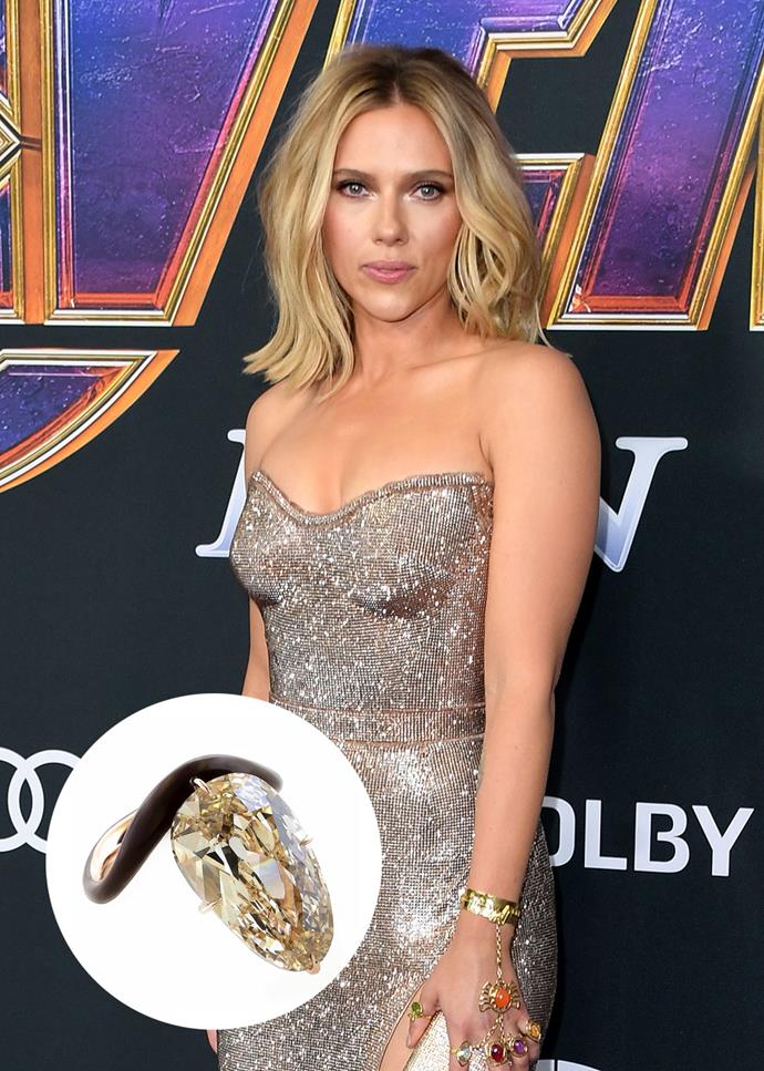 **Scarlett Johansson**<br><br>

Scarlett Johansson's [new piece](https://www.harpersbazaar.com.au/bazaar-bride/scarlett-johansson-engagement-ring-18997|target="_blank") from fiancé Colin Jost features an 11-carat 'light brown diamond' on a black band. It is designed by James de Givenchy.