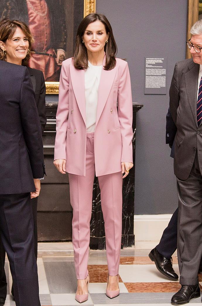**QUEEN LETIZIA OF SPAIN**
<br><br>
Queen Letizia of Spain donned a pink pant suit while at the 'La Otra Corte. Mujeres de la Casa de Austria en los Monasterios Reales de las Descalzas y la Encarnacion' exhibition at the Royal Palace in December 2019 in Madrid, Spain.
