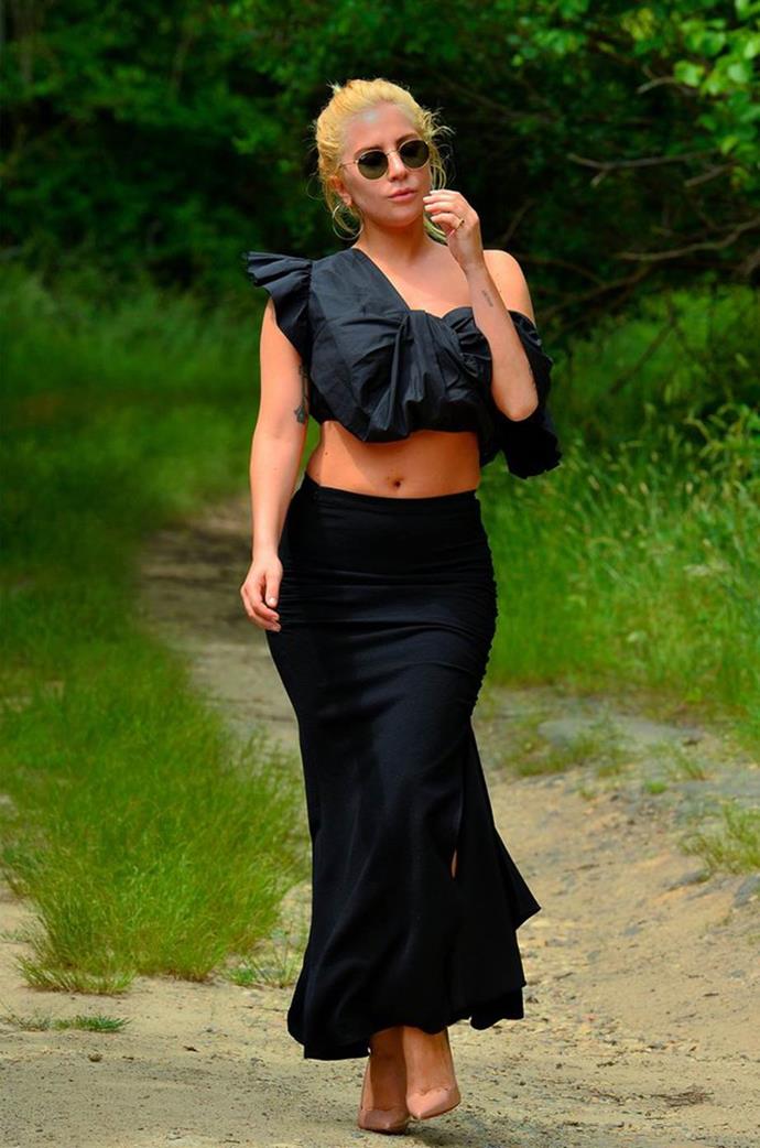 Lady Gaga wearing Christian Louboutin heels and a slinky black skirt for a hike.