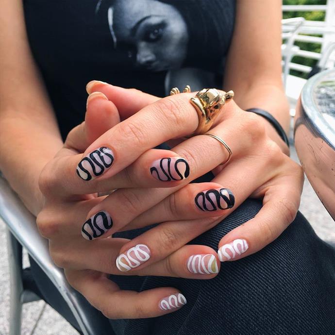 **The Squiggly Line Manicure**
<br><br>
Ideal for the clumsy and shaky nail artists among us (guilty!), the [Squiggly Line Manicure](https://www.elle.com.au/beauty/squiggly-nail-art-trend-24111|target="_blank") is the perfect solution for nail art novices or those looking for a salon-ready look minus the professional. Easy to replicate, it's rather difficult to mess this one up.
<br><br>
*Image via [@jessicawashick](https://www.instagram.com/p/BYy7jcKAbPv/|target="_blank"|rel="nofollow").*