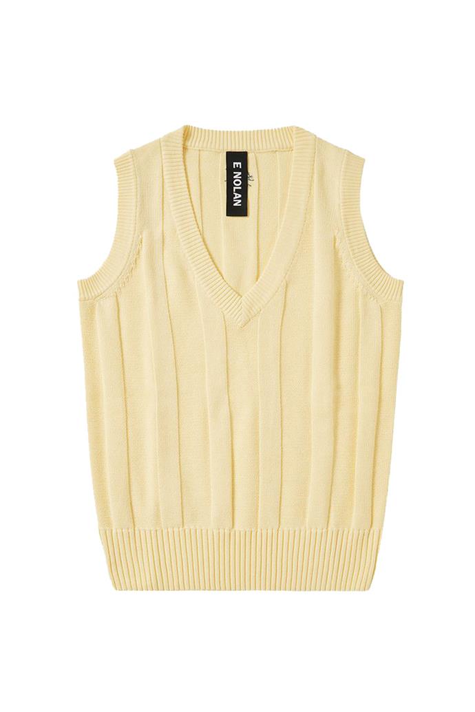 Cotton Cricket Vest in Yellow Sherbet, $215 at [E Nolan](https://enolan.com.au/collections/knitwear/products/cricket-vest-yellow-sherbet|target="_blank"|rel="nofollow")