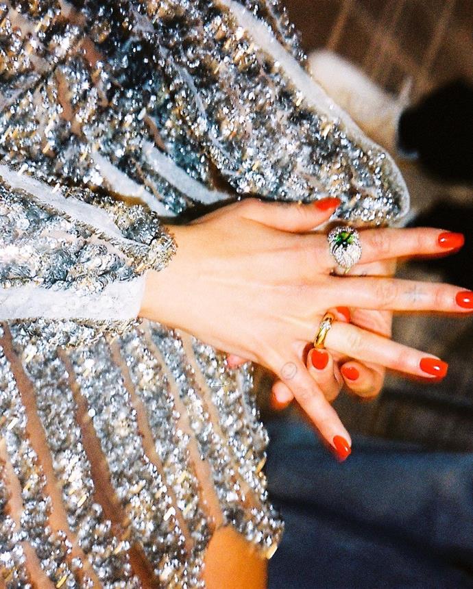 Dua Lipa also sported an impressive collection of ornate rings and long earrings from Chopard jewellery.
