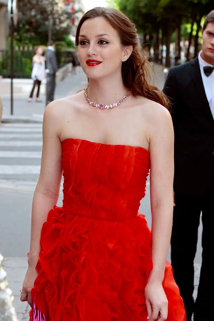 Her stunning crimson red, ruffled gown paired perfectly with a matching Harry Winston choker and a train station encounter with the now-French Chuck Bass.