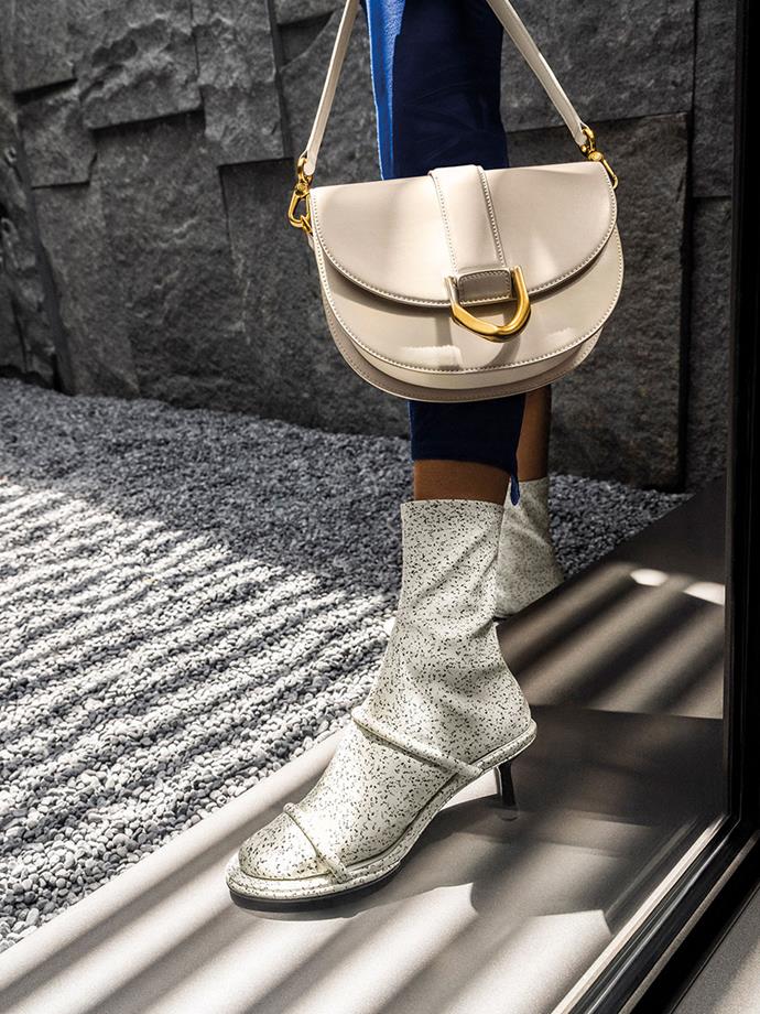 **[Gabine Saddle Bag](https://www.charleskeith.com/au/bags/CK2-80781610-1_CREAM.html?utm_source=collab-elle-au&utm_medium=affiliate&utm_campaign=fall-collection-2021&utm_content=editorial|target="_blank"|rel="nofollow")**

This gorgeous medium-sized carryall shows off a signature curved-bottom silhouette and gold-tone buckle accent, with a versatile twist. Carry it in your hand as a clutch, or use either the short and long straps to wear it over your shoulder. It's easy to see why this chic bag has gained cult following amongst trendsetters such as Yoyo Cao, Aimee Song, Lily May Mac, and Tamu McPherson. Now available in a selection of new colours including cream, dark green, mustard, and signature black, the coveted Gabine Saddle Bag is better than ever.