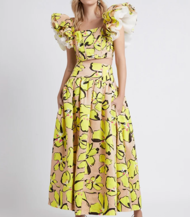 **Pelicano Citrus Bloom Midi Skirt, $495 from [Aje, shop here](https://ajeworld.com.au/collections/new-arrivals/products/pelicano-midi-skirt-citrus-bloom|target="_blank")** 
<br>
**Pelicano Citrus Bloom Frill Cropped Top, $295 from [Aje, shop here.](https://ajeworld.com.au/collections/new-arrivals/products/pelicano-frill-cropped-top-citrus-bloom|target="_blank")**
