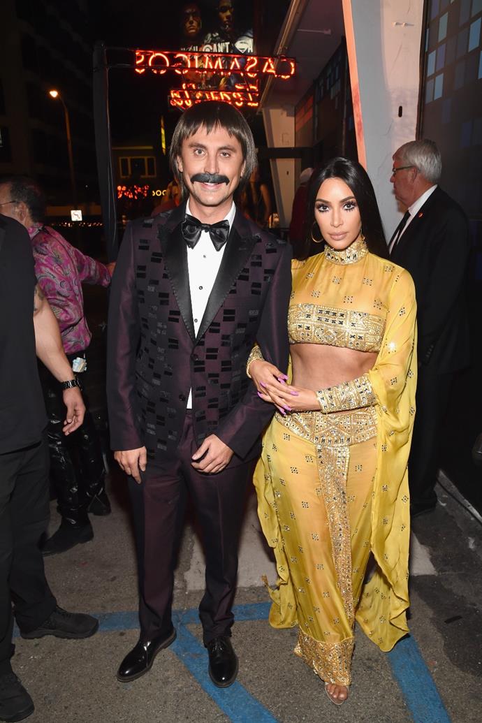 Kim Kardashian West and BFF Jonathan Cheban, also known as 'Food God', as Cher and Sonny Bono for a 70's themed Halloween party in 2017.