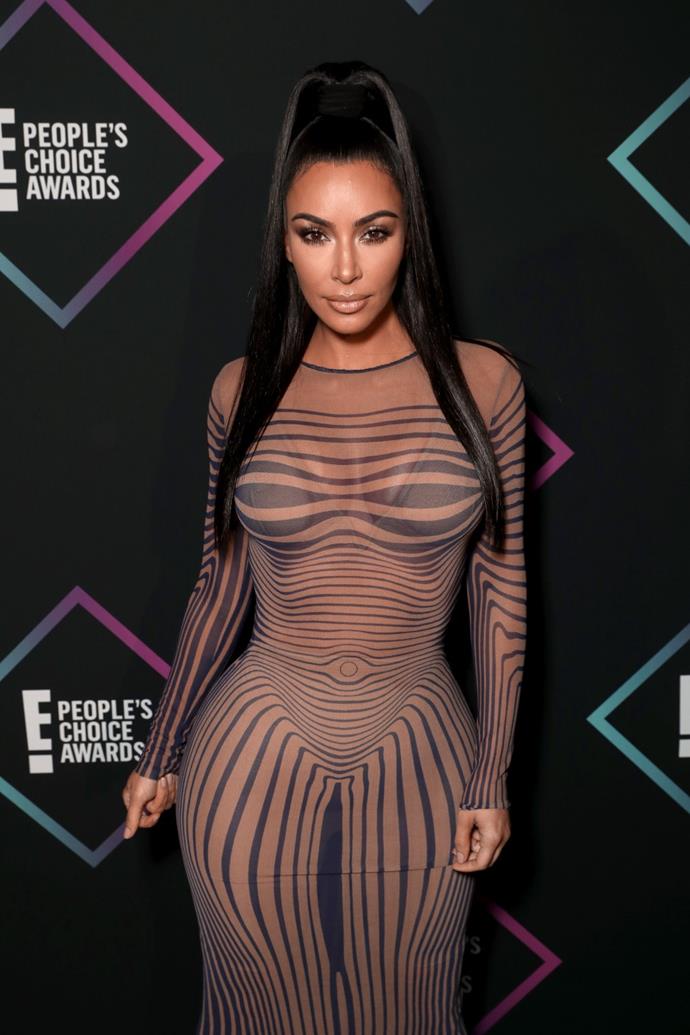 Kim Kardashian West in vintage mesh Jean Paul Gaultier bodycon dress at the People's Choice Awards
