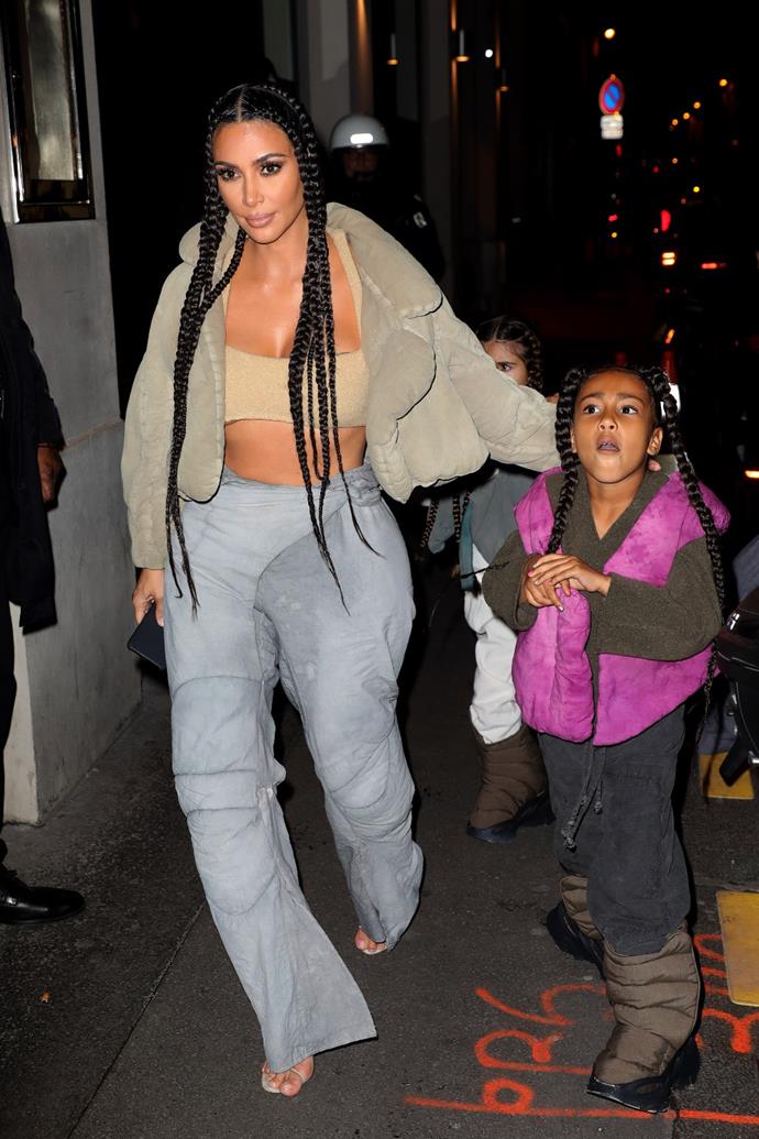 Kim Kardashian West in full 'momager' mode with daughter North in Paris as they head to the YEEZY fashion show in matching outfits.
