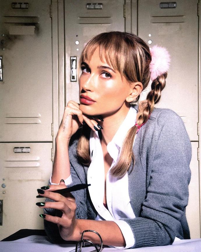 **Hailey Bieber**
<br><br>
Hailey Bieber opted for neutral makeup and plaits à la Britney Spears in her "Oops!... I Did It Again" music video.
<br><br>
*Image: [@haileybieber](https://www.instagram.com/p/CVqST5Yvj7n/|target="_blank"|rel="nofollow")*