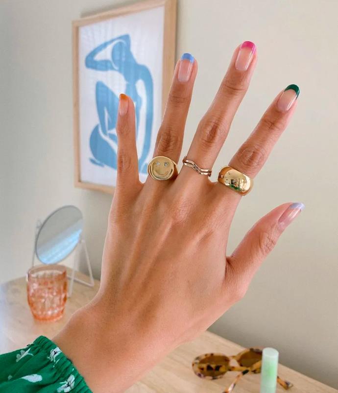 **Rainbow French Tips**
<br><br>
The classic that just keeps coming back. A sweet and summer-loving twist on the iconic French manicure, the [Rainbow French Tip](https://www.elle.com.au/beauty/colour-french-manicure-25271|target="_blank") is the best of both worlds—multi-coloured fun with the sophistication of a delicate tip. The best bit? It's not hard to do on your lonesome.
<br><br>
*Image: [@overglowedit](https://www.instagram.com/p/B-vALaYgR2C/|target="_blank"|rel="nofollow")*