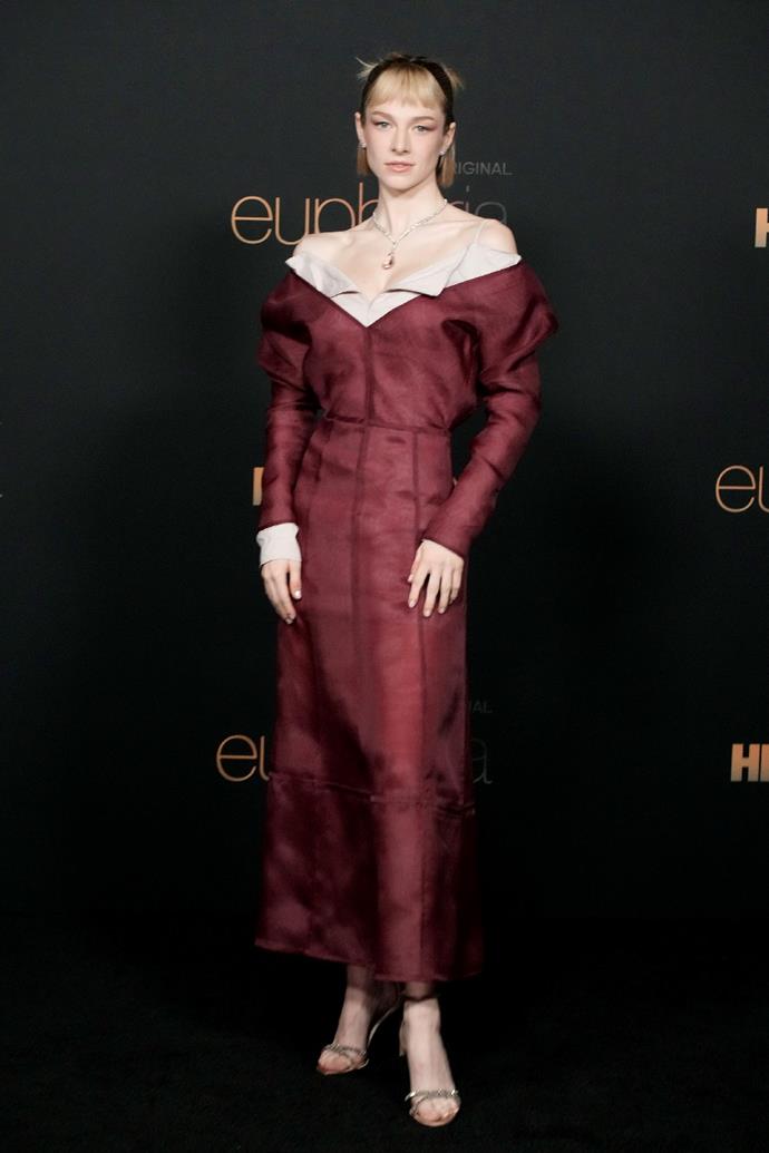 **Hunter Schafer in Prada**
<br><br>
A considerable departure from her character Jules, [Hunter Schafer](https://www.elle.com.au/fashion/hunter-schafer-style-21052|target="_blank") wowed in a custom Prada gown. The cream collared mini was styled under a burgundy off-the-shoulder slip.
<br><br>
Schafer fronted Prada's Gallaria bag campaign, before making her [Met Gala](https://www.elle.com.au/fashion/met-gala-2021-red-carpet-25918|target="_blank") debut in 90s-eqsue silver two piece. Here's hoping this won't be the last we see of Schafer and Miuccia Prada.