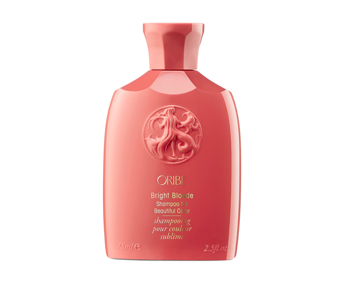 **Bright Blonde Shampoo by Oribe, $68 at [Adore Beauty](https://www.adorebeauty.com.au/oribe/oribe-bright-blonde-shampoo.html|target="_blank")**
<br><br>
Don't let the warm (albeit chic) shade of the bottle fool you; the luxurious formula inside is pure purple goodness; the kind of goodness that will cool your colour *and* contribute to overall hydration/softness/smoothness.