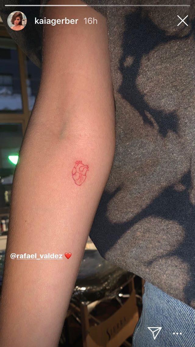 Kaia paid a visit to celebrity tattoo artist JonBoy for a tiny, yet detailed tattoo of a human heart in red ink on her inner forearm.