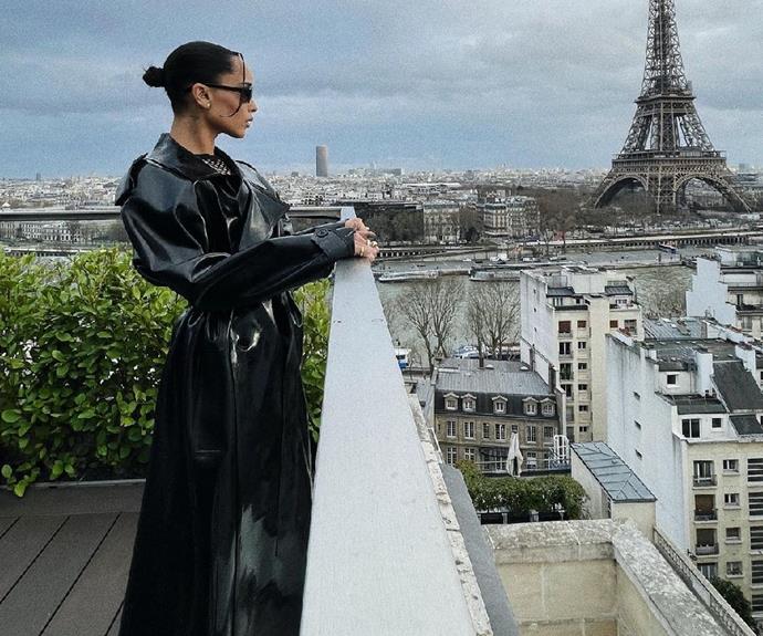 For *The Batman* press tour, Zoë kicked it off with a bang in none other than this *Matrix* inspired trench coat and micro sunglasses. Here lies Paris' best view, and the Eiffel tower.