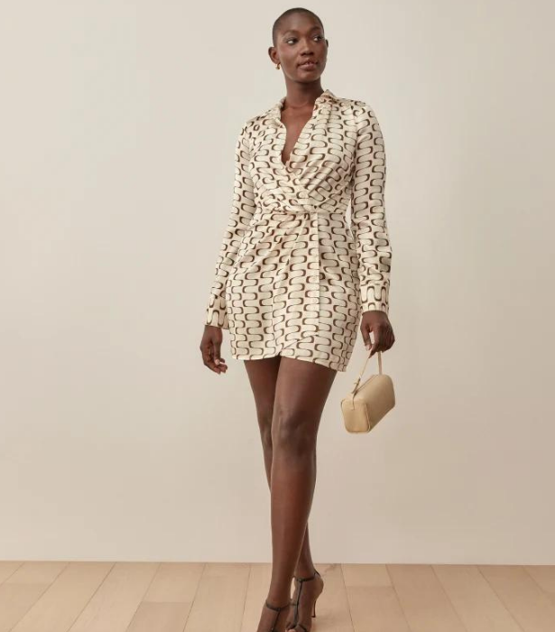 Alaine Silk Dress, $400 at [Reformation](https://www.thereformation.com/products/alaine-silk-dress/1309814IVO.html?dwvar_1309814IVO_color=REQ&quantity=1|target="_blank"|rel="nofollow") 