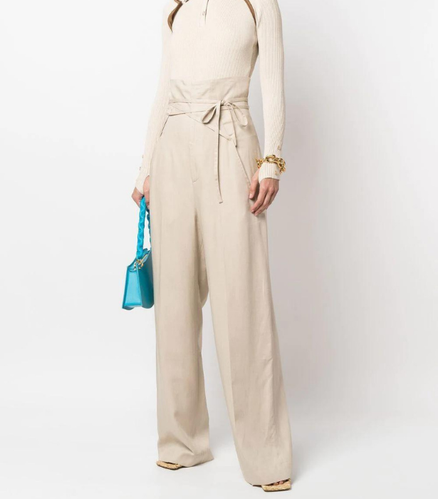 Jacquemus Tied-Waist High-Waisted Trousers, $780 at [FARFETCH](https://www.farfetch.com/au/shopping/women/jacquemus-tied-waist-high-waisted-trousers-item-18347192.aspx?storeid=13537|target="_blank"|rel="nofollow") 
