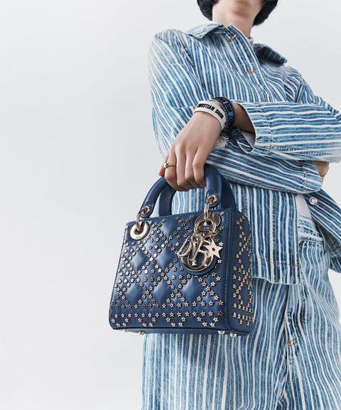 **Who:** [Dior](https://www.elle.com.au/fashion/dior-online-shopping-boutique-launch-australia-25878|target="_blank")
<br><br>
**What:** The Lucky Dior
<br><br>
**Where:** The night sky.
<br><br>
**Why:** You're not the only one obsessed with astrology. Lucky Dior, the latest from the maison, is Maria Grazia Chiuri's love letter to Christian Dior's passion for signs of destiny. The astrology-inspired print appears on dresses, pants, shorts, sneakers, sandals, and of course, bags (including the eternally stylish Lady Dior). The fault in our stars? Sir, we can see none.