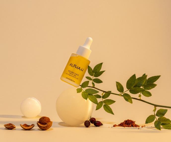 **Who:** Cult-favourite A-beauty brand Alpha-H.
<br><br>
**What:** A plumping and soothing face oil claiming to deliver juicy skin.
<br><br>
**Where:** Available to purchase online [here](https://alpha-h.com/pages/golden-haze-face-oil|target="_blank").
<br><br>
**Why:** [Australian beauty brand](https://ellaau.com/fashion/female-founded-australian-brands-26720|target="_blank") Alpha-H are promising to bring about bright and bouncy skin with the launch of their latest multi-tasking beauty product, the Golden Haze Face Oil. 
<br><br>
Comprising of a blend of nine, rich oils, the product claims to be suitable for all skin types and will minimise breakouts and balance sebum production. Plus, this oil almost doubles as a fragrance with a unique yet captivating scent of cedarwood, jasmine, vanilla and ylang ylang.