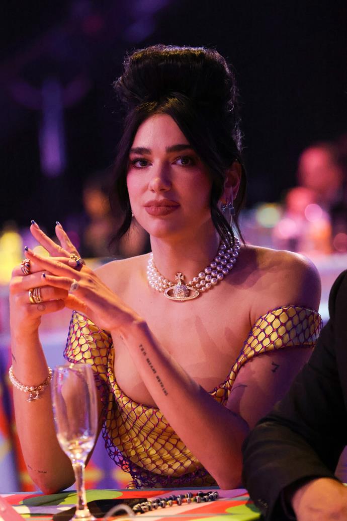 Taking home a few wins at the 2021 BRIT Awards, Dua's beehive hairdo was the show-stopping beauty look that pulled together her old world ensemble, complete with statement pearl jewellery.