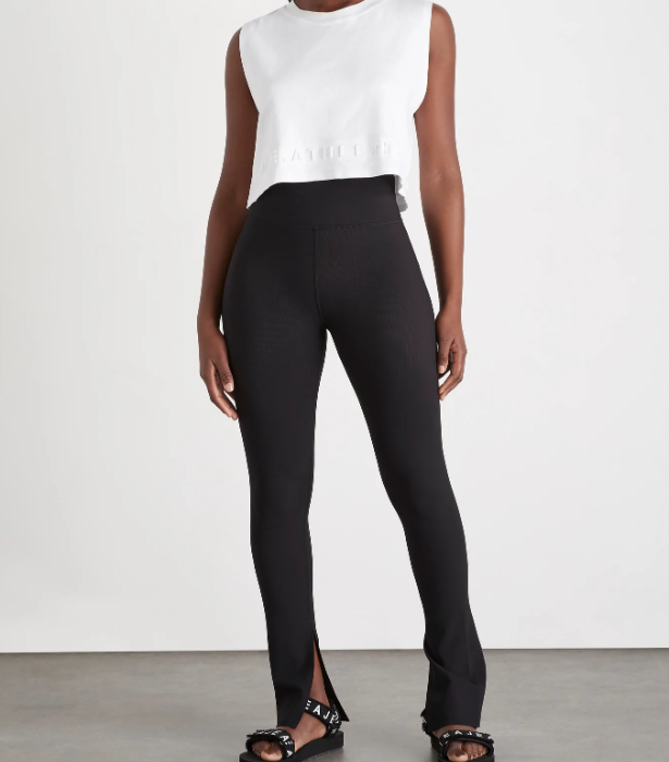 High Waiste Split Hem Legging, $155 at [AJE ATHLETICA](https://go.linkby.com/ESXYIGCG/collections/gifts-under-250/products/high-waist-split-hem-legging-205-black|target="_blank"|rel="nofollow")