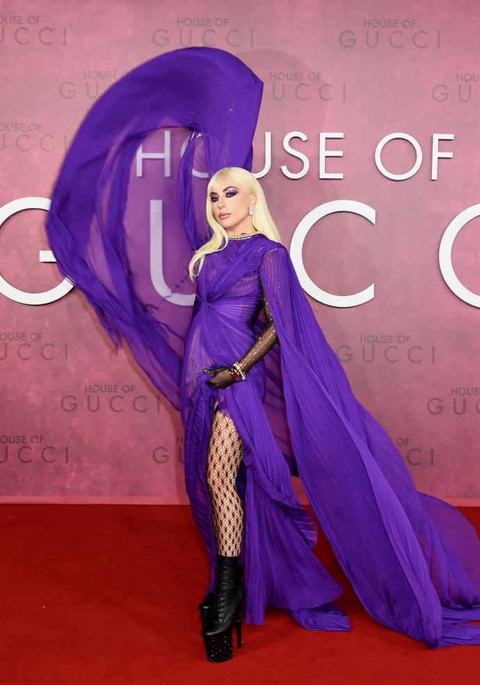 Lady Gaga wearing Gucci 'Love Parade' look 67 to the *House Of Gucci* London Premiere.