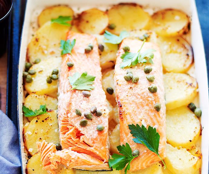 Lemon and garlic roast salmon on potatoes