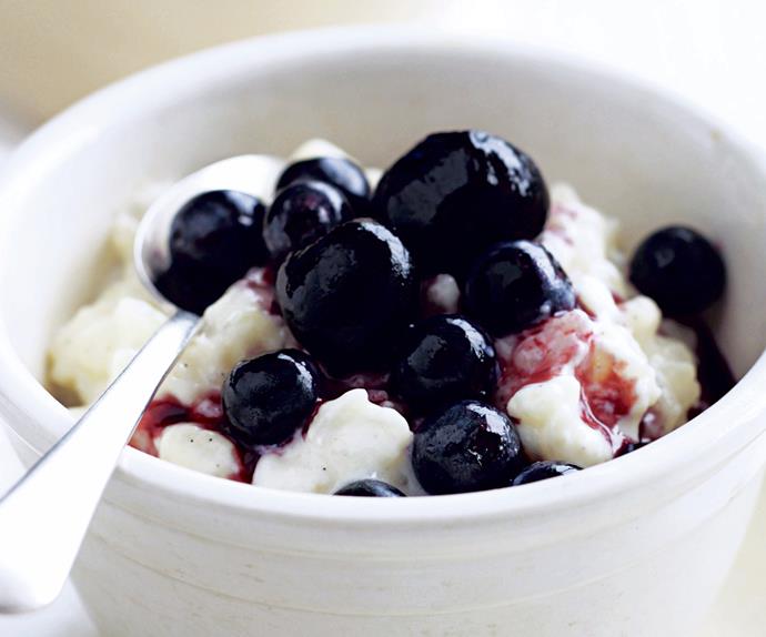 Creamed rice with poached cherries and blueberries