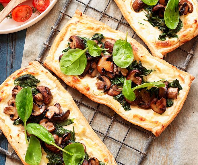Mushroom and spinach tarts with tomato salad