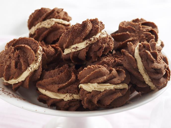 **[Chocolate melting moments with coffee cream](https://www.womensweeklyfood.com.au/recipes/chocolate-melting-moments-with-coffee-cream-28098|target="_blank")**

Rich, crumbly, chocolatey biscuits are sandwiched with a rich coffee cream filling to create these divine bite sized treats. Enjoy with a mug of coffee or tea for a lovely sweet treat.