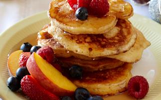 Fluffy pancakes with maple fruits