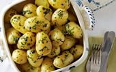 Boiled new potatoes with minty herb butter