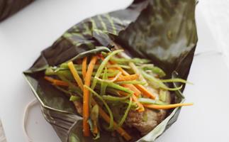 snapper wrapped in banana leaves