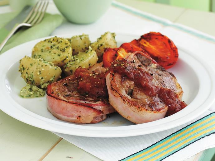 **[Bacon-wrapped chops with baby potatoes in olive pesto](https://www.womensweeklyfood.com.au/recipes/bacon-wrapped-chops-with-baby-potatoes-in-olive-pesto-12430|target="_blank")**

Pork wrapped in bacon, what could be better.