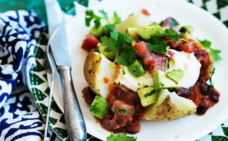 mexican stuffed potatoes with spiced tomato and avocado salsa