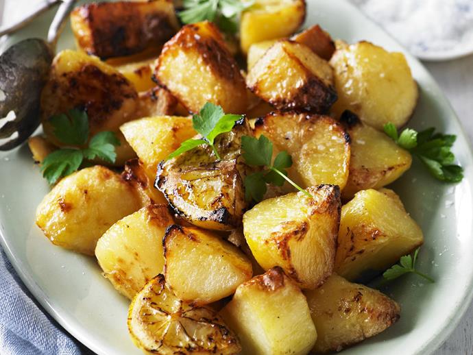Baked with lemon, this is the [perfect roast potatoes](https://www.womensweeklyfood.com.au/recipes/roast-potatoes-recipe-9550|target="_blank") recipe to add to your dinner repertoire. By adding par-boiled floury potatoes to a hot, oiled baking tray with lemon, these potatoes become perfectly crisp on the outside, fluffy on the inside, with a delicious hint of citrusy brightness.