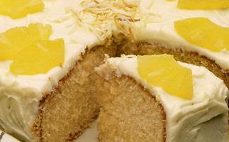 PINEAPPLE COCONUT CAKE WITH PINEAPPLE FROSTING