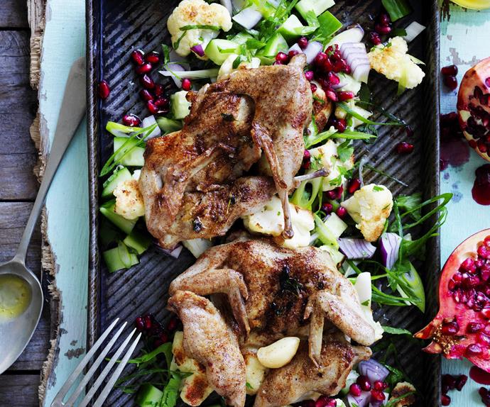 char-grilled quail with cauliflower and pomegranate salad
