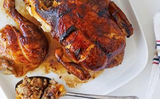Roast chicken with sausage and apricot stuffing